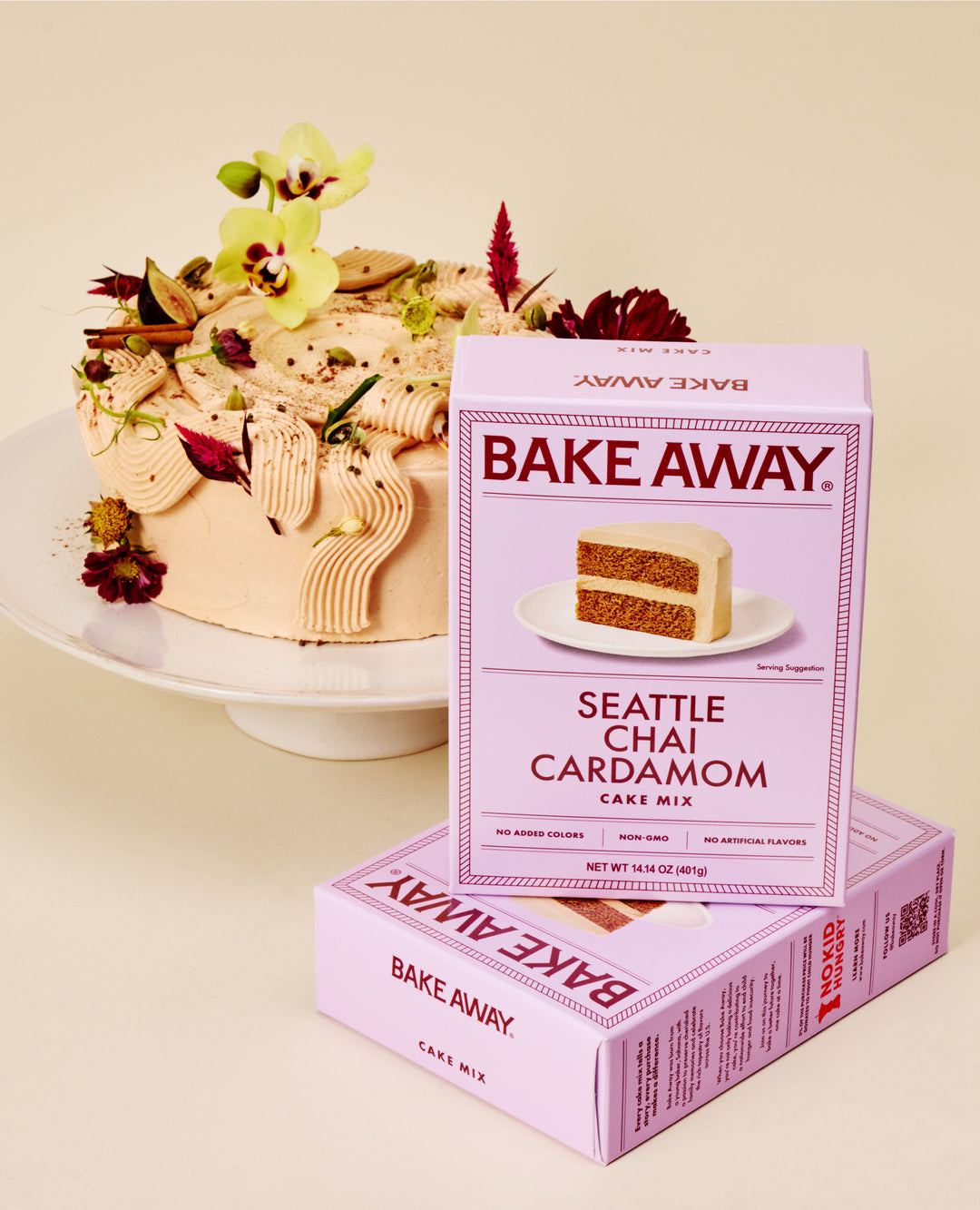 Bake Away Seattle Chai Cardamom cake mix box with a decorated cake on a beige background