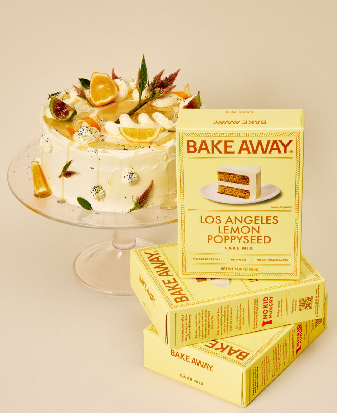 Bake Away Los Angeles Lemon Poppyseed cake mix boxes with a decorated cake on a beige background